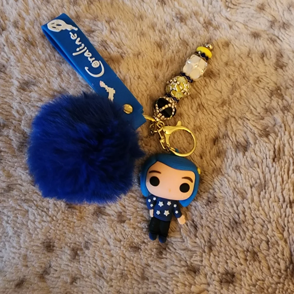 Coraline Blue Shirt Star Blue Pom Pom Key Holder with Character Charm Beaded